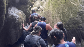 San Juan: Caves & Waterfall Adventure in Charco Azul