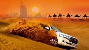 Dubai: Wüstensafari Kamelreiten, Sandboarding & BBQ Dinner