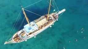 Mykonos: Crociera in barca al tramonto con 1 drink