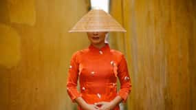 Photographie Ao Dai : Capture d'une tenue traditionnelle à Hoi An