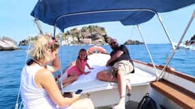 Tour in barca di Aci Trezza al tramonto e cena a casa di una famiglia siciliana