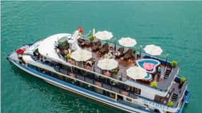 Crucero de un día por Ha Long con kayak y fiesta al atardecer