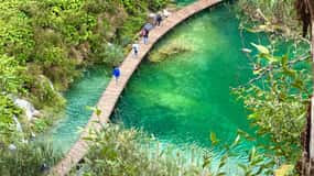 From Zadar: Plitvice Lakes Guided Tour with Boat & Train