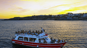 Boat Party al Tramonto nelle acque del Salento con Drink