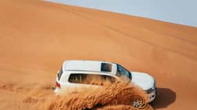 Dubai: Jeep Desert Safari, Camel Ride, and Quad Bike Tour
