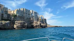 Coast and caves of Polignano:boat tours,drinks,swimming,music and fun