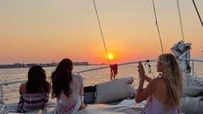 Rhodes: Sunset Cruise with Open Bar, Dinner, & Live Music