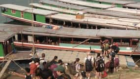 From Chiangrai: Slow Baot to Loas (Luangprabang) 2-Day Tour