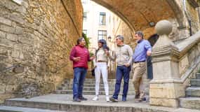 From Barcelona: Girona, Calella & Medieval Village Day Trip