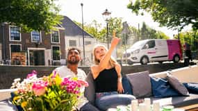 Amsterdam: Tysk guidet kanalrundfart med bar om bord