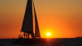 Balade en catamaran aux îles Lavezzi au coucher du soleil avec Snorkeling