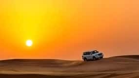 Qatar: Sunset Desert Safari with Camel Ride & Sandboarding
