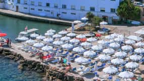 Porto Santo Stefano: La Caletta beach club - Cocktails under the umbrella