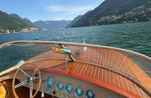 image n.4 of Lake Como: Private Tour On A Wooden Boat w/ Swim & Prosecco activity in Como, uploaded by supplier