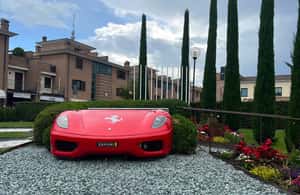 From Bologna: Ferrari Museums, Factory Tour and F1 Simulator