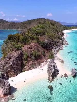gambar no.2 daripada Coron: Tebing Pantai, Pantai & Lawatan Melompat Pulau Malcapuya aktiviti di Coron, dimuat naik oleh pembekal 