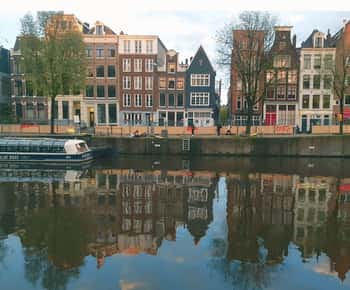 Amsterdam: Dag Stadstur med lokal guide på tyska