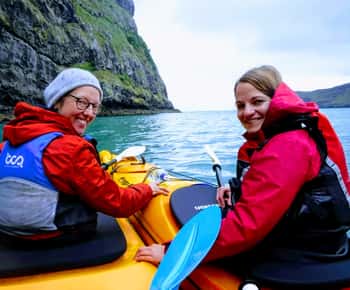 Akaroa: Guided Sunrise Sea Kayaking Tour