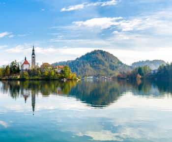 From Ljubljana: Lake Bled & Postojna Cave with Entry Tickets
