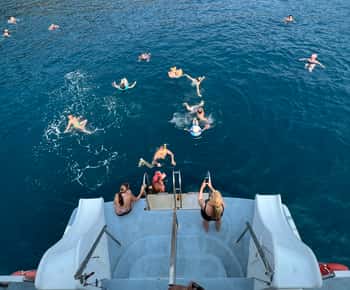 From Roses: Cap Norfeu and Tamariu Cave Boat Tour