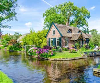 Giethoorn, cruzeiro guiado por barcos públicos, passeio pelos moinhos de vento de Zaanse Schans