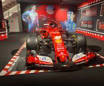 From Bologna: Ferrari Museums, Factory Tour and F1 Simulator
