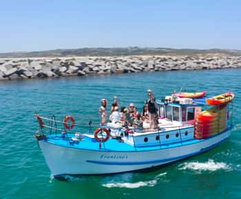 Alvor: Explore cavernas em passeio de barco e caiaque