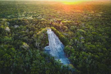 From Cancun or Riviera Maya: Cobá and Río Secreto Day Trip