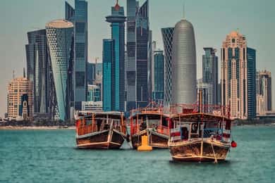 Doha: traditional Dhow Harbour, Skyline view , Sunset