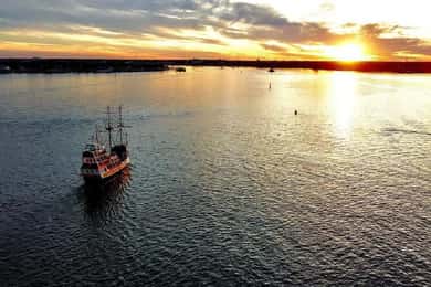 Augustine: Black Raven Tropical Sunset Cruise
