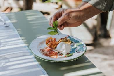 Typical Apulian dinner in the garden of an ancient Trullo
