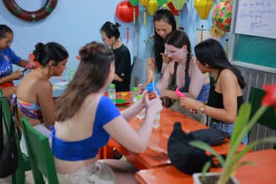 Hoi An : Lantern Boat Ride & Flower Lantern Making Class.