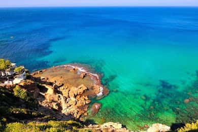 Denia: Cova tallada Catamaran Trip w/ Mussel Tasting & Wine