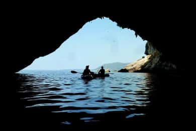 From Agios Ioannis Beach: Kayak Day Trip to Papanikolis Cave