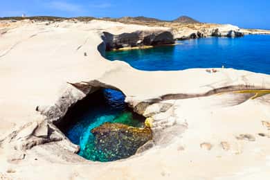 From Sifnos: Kimolos and North Milos Speedboat Tour