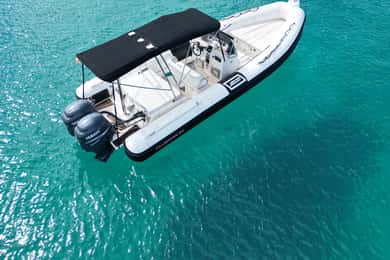 San Antonio: Private Boat Experience with Paddle Surfing and Snorkeling