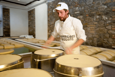 Parmesan Wheels near Parma: Tasting & Factory Tour