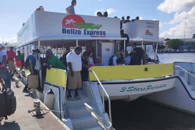 Flores: Belize/Caye Caulke/San Pedro Van or Ferry Transfer