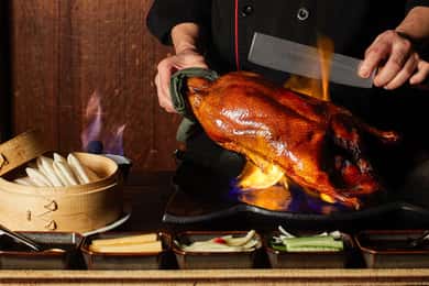 Pechino: Spettacolo acrobatico, mercato delle perle e cena a base di anatra alla pechinese