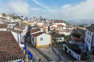 Private Day Tour Medieval Obidos, Nazare wave & Peniche Surf