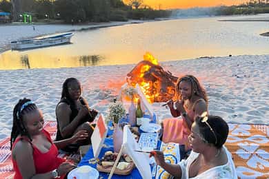DIANI: A ROMANTIC BEACH BONFIRE DINNER SET UP