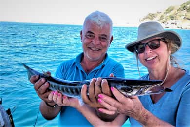Rhodes: Fishing Trip, Snorkelling, BBQ, & Professional Guide