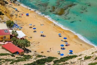 From Heraklion: Red Beach Tour with Hike, Pickup Included