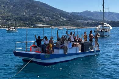 Catamaran tour along the Cefalù coast with aperitif and snorkeling