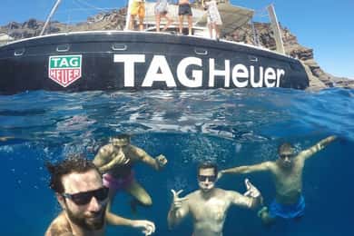 Santorini: Adventurous Catamaran Experience with Snorkeling