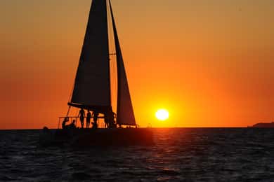 Catamarantur til Lavezzi-øerne ved solnedgang med snorkling