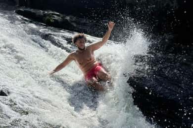 San Juan: El Yunque Waterslide & Waterfall Tour with Snacks