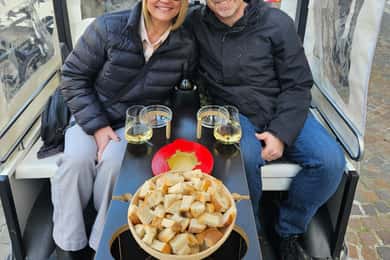Fondue and wine private Tuk Tuk tour in Geneva