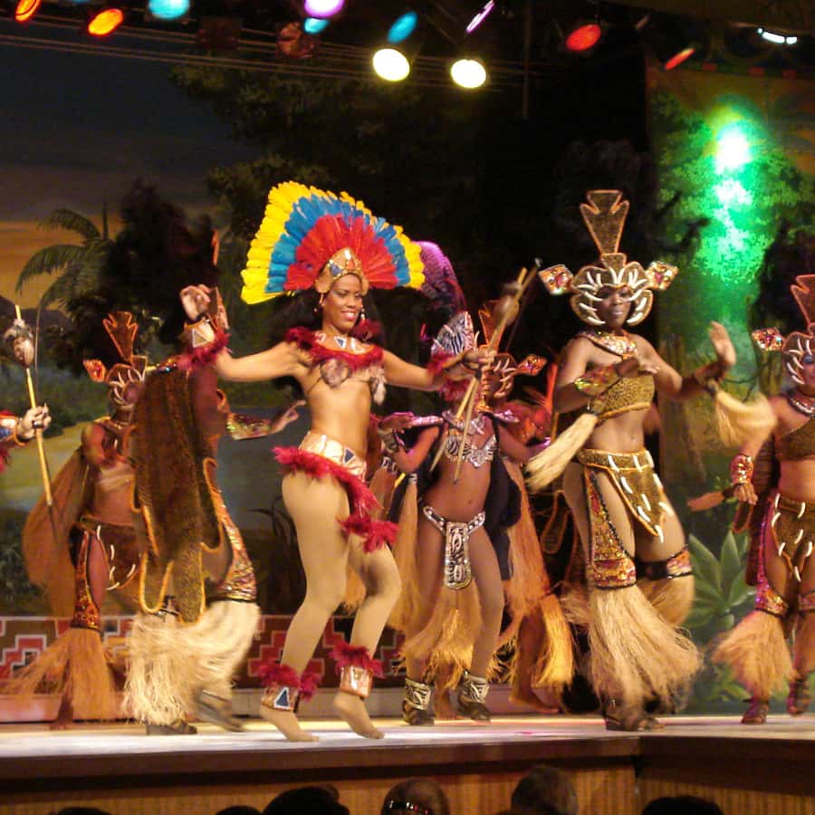 Colorful Colombian dancers performing at a festival in 2026