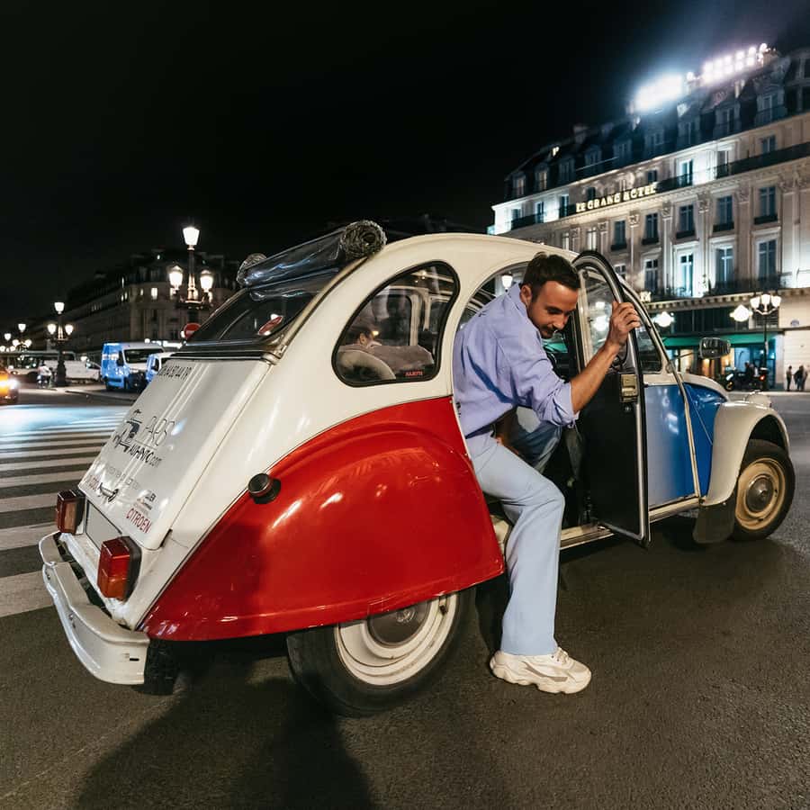 Paris: Discover Paris by Night in a Vintage Car with a Local